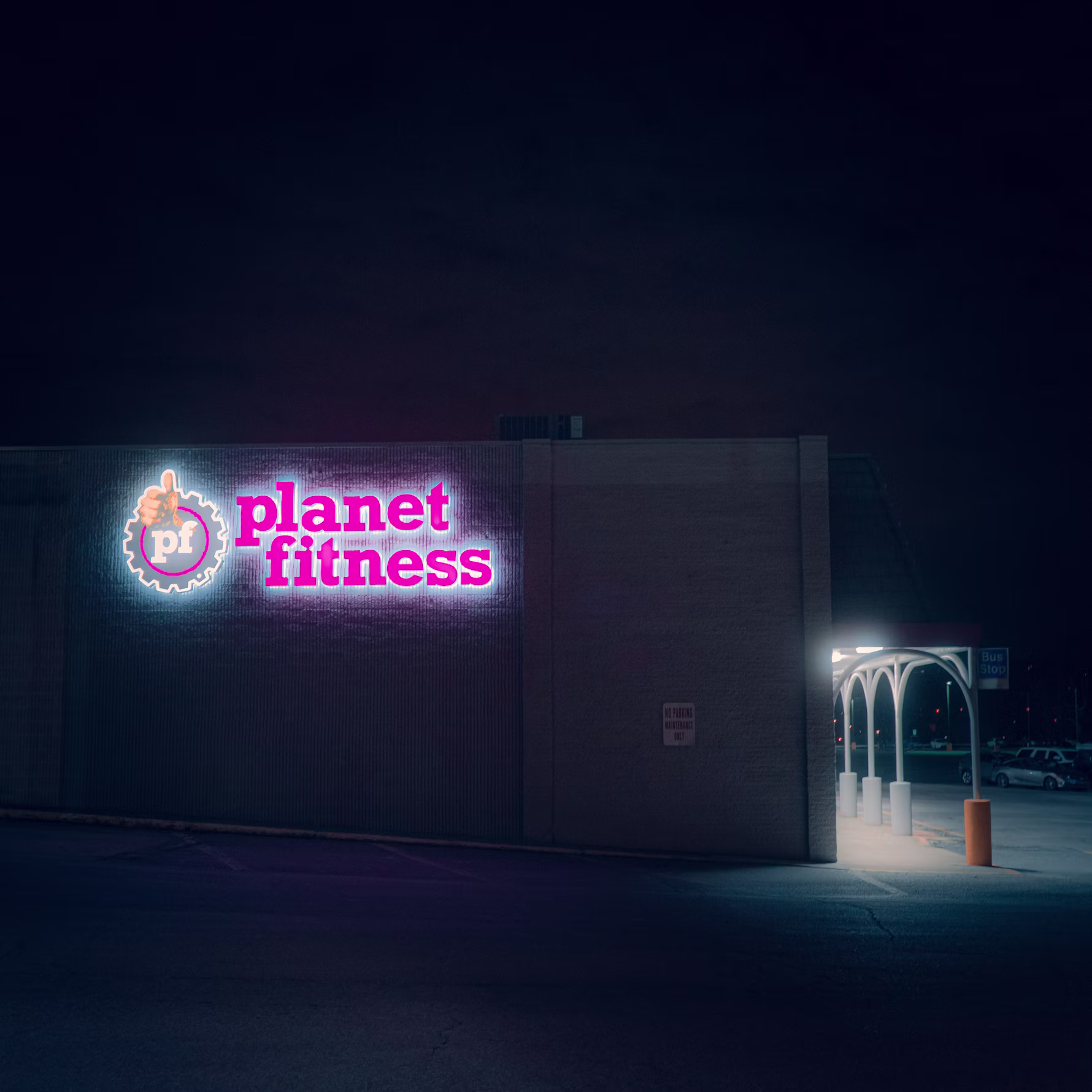 Gym sign illuminated at night