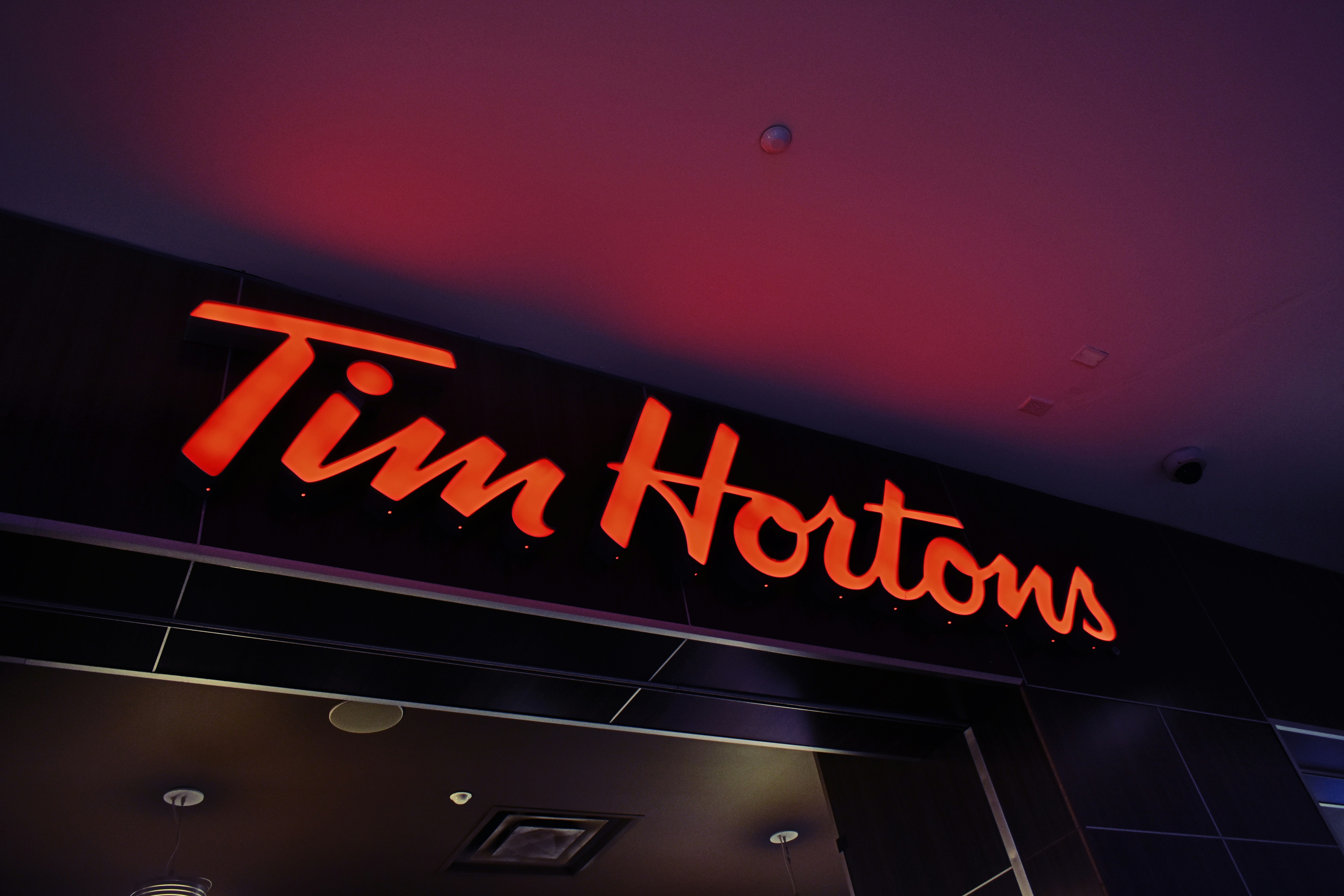 Restaurant sign illuminated at night