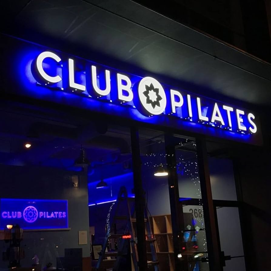 Retail shop sign illuminated